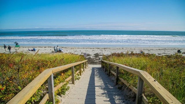 View of a wooden walking leading to Footbridge beach