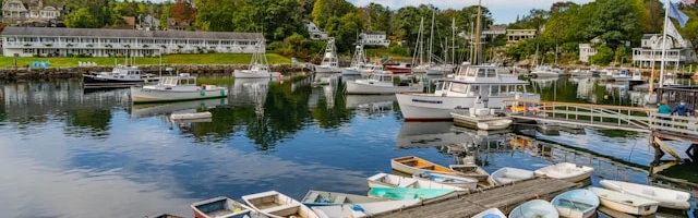 View of various boats floating in Perkins Cove