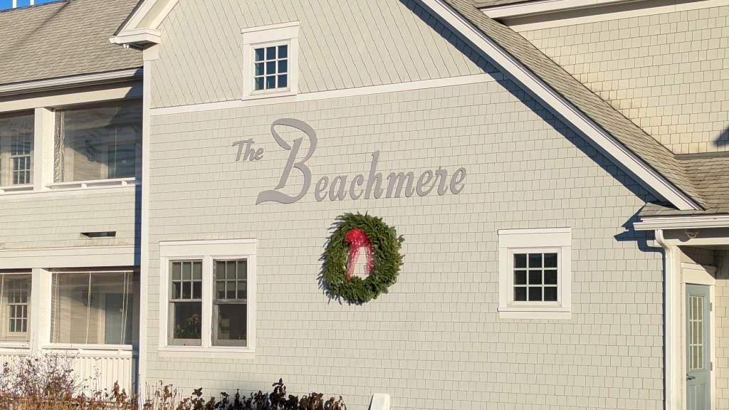 A view of the Beachmere Inn exterior with a hanging wreath